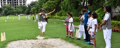DPS Agra primary school students holding storybooks during classroom reading activity